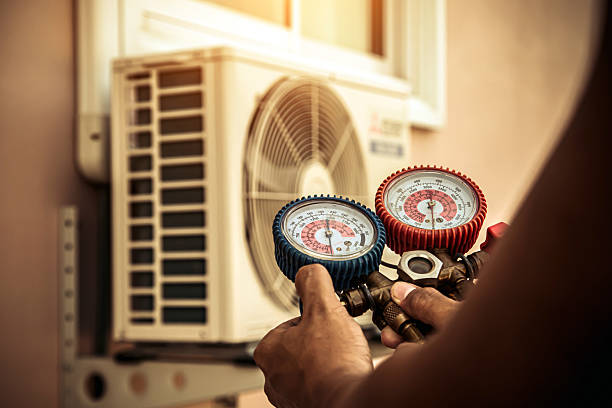 Professional Air Conditioning Service technician working in Apple Valley, MN